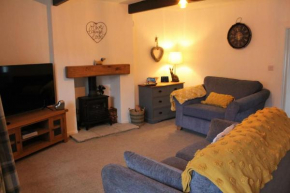 Bumblebee Cottage nestled in stunning countryside.